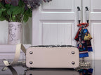 Louis Vuitton beaded handbag with front flap, silver snap studs and crossbody chain