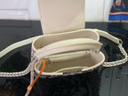 Louis Vuitton beaded handbag open interior with zipper and silver chain strap