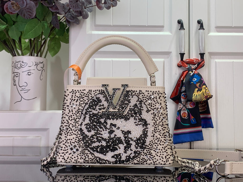 Louis Vuitton beaded handbag with top handles, white with black speckled pattern