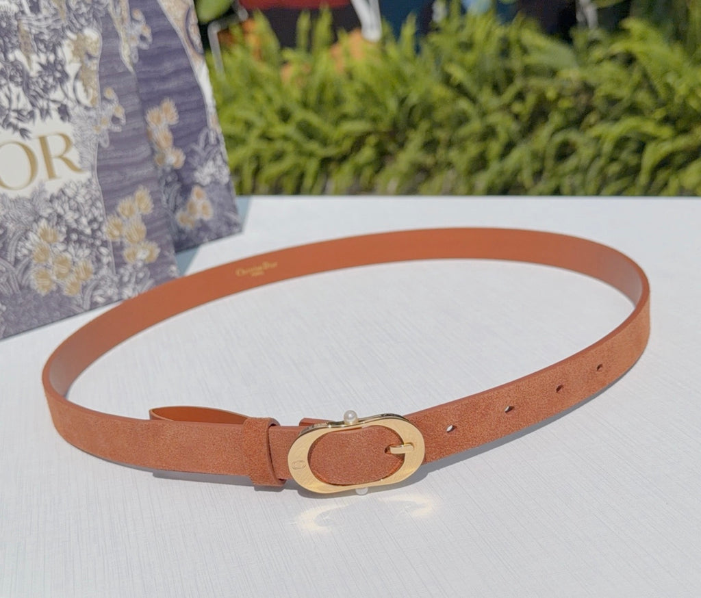 Tan leather belt with gold-tone oval buckle and adjustable holes