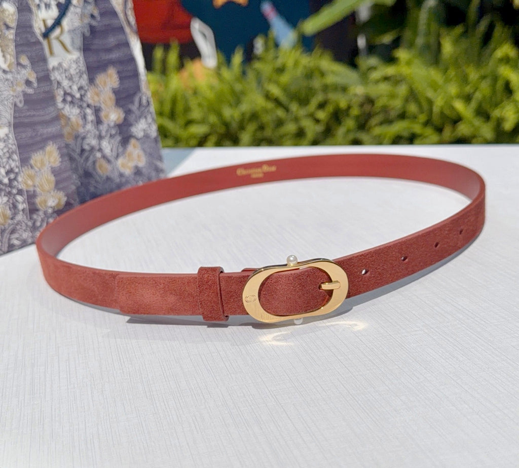 Tan leather belt with gold-tone circular buckle and adjustable holes