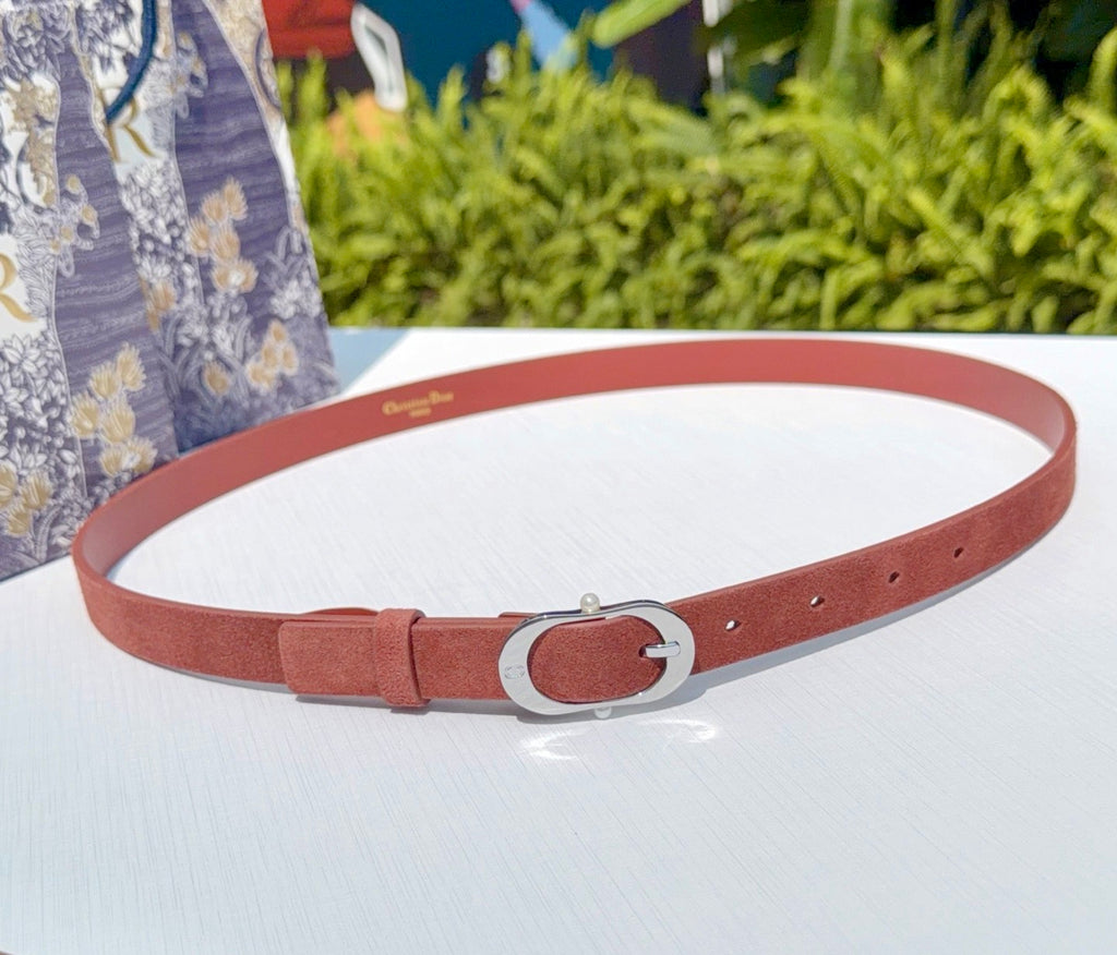 Dior belt in reddish-brown leather with silver O-ring buckle and adjustable holes