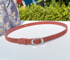 Dior belt in reddish-brown leather with silver O-ring buckle and adjustable holes