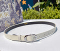 Dior belt in light cream textured leather with silver oval buckle