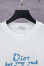 White crewneck T-shirt with Dior neck label and blue 'Dior for my real' text