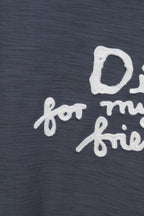 Dark blue T-shirt close-up of white 'for my real friends' lettering