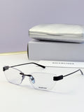 Balenciaga eyeglasses with clear lenses, thin dark metal frame and logo temples