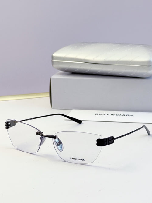 Balenciaga eyeglasses with clear lenses, thin dark metal frame and logo temples