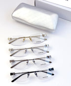 Balenciaga eyeglasses set with clear lenses, metal frames in dark and light tones