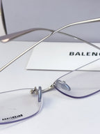 Balenciaga eyeglasses close-up with clear lenses, thin metal frame and nose bridge