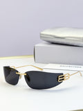 Balenciaga sunglasses with gold metal frame and dark tinted lenses, logo bar detail
