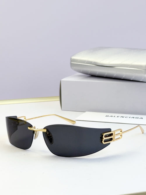 Balenciaga sunglasses with gold metal frame and dark tinted lenses, logo bar detail