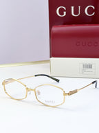 Gold full-rim glasses with clear lenses and ribbed metal temple arms