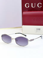 Clear and silver glasses with purple tinted lenses and ribbed metal temple arms