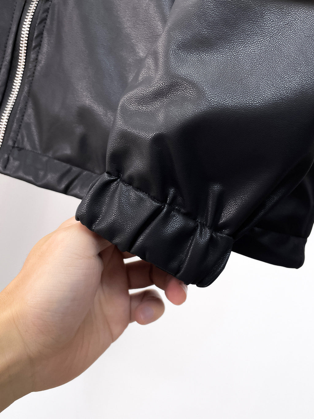Black long jacket cuff with ruched elastic hem and gathered fabric