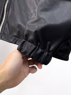 Black long jacket cuff with ruched elastic hem and gathered fabric