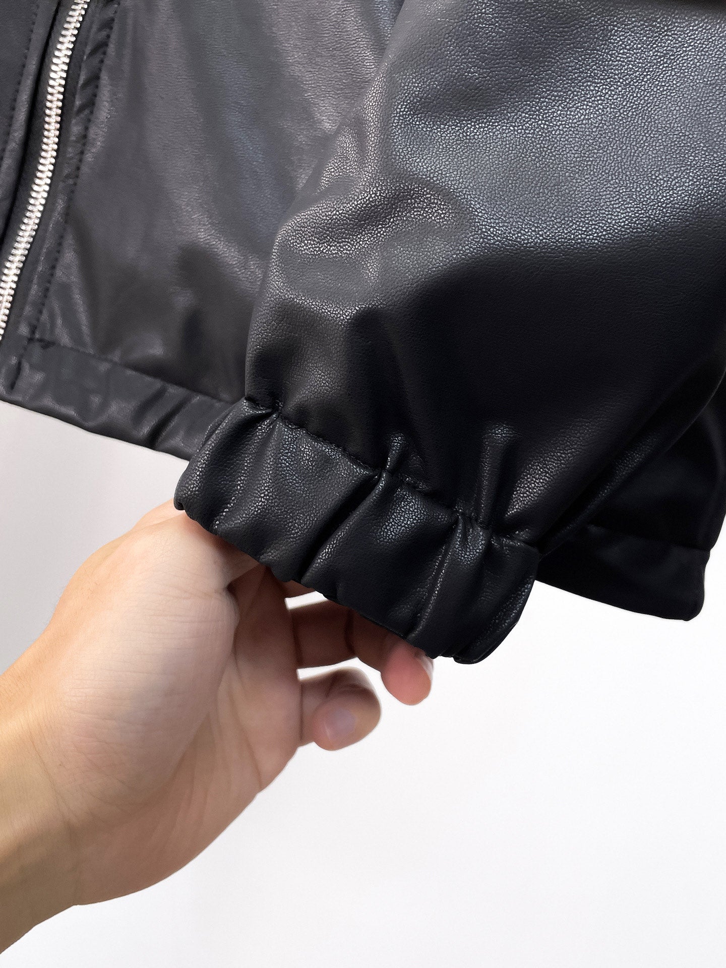Black long jacket cuff with ruched elastic hem and gathered fabric