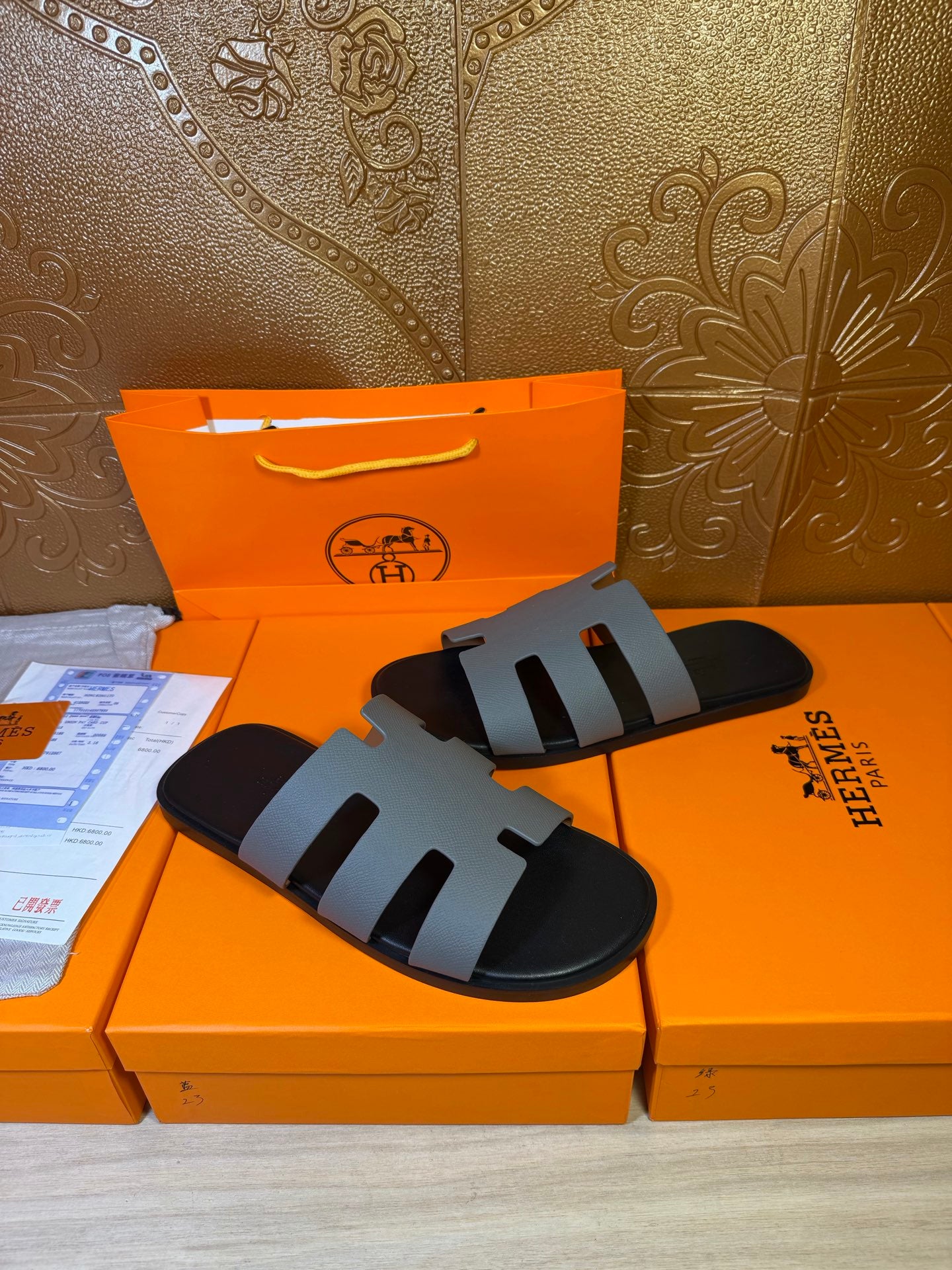 Hermes sandals, dark footbed with light gray strap bands on top