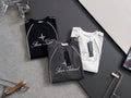 Stone Island black T-shirt with white star and script logo, short sleeves