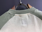 T-shirt back neck yoke with vertical embroidered AMI lettering