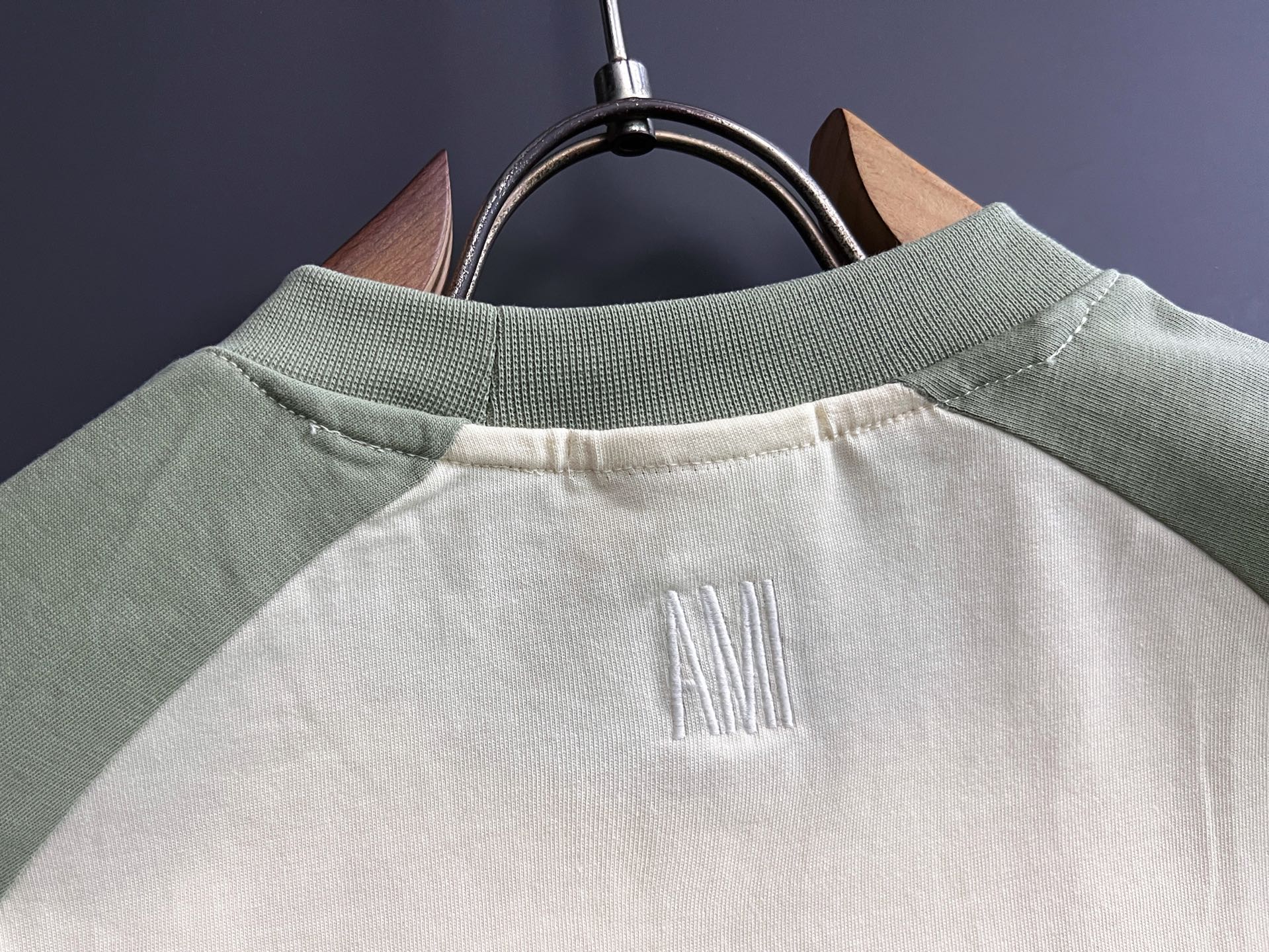 T-shirt back neck yoke with vertical embroidered AMI lettering