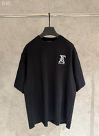 Black short-sleeve T-shirt with small Louis Vuitton chest logo
