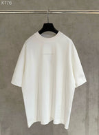 White Balenciaga T-shirt with crew neck, short sleeves, and small front logo detail