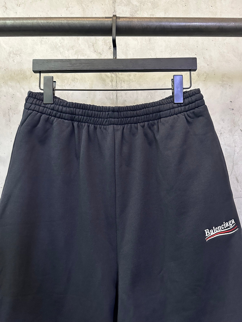 Black elastic-waist shorts with drawstring and Balenciaga side logo