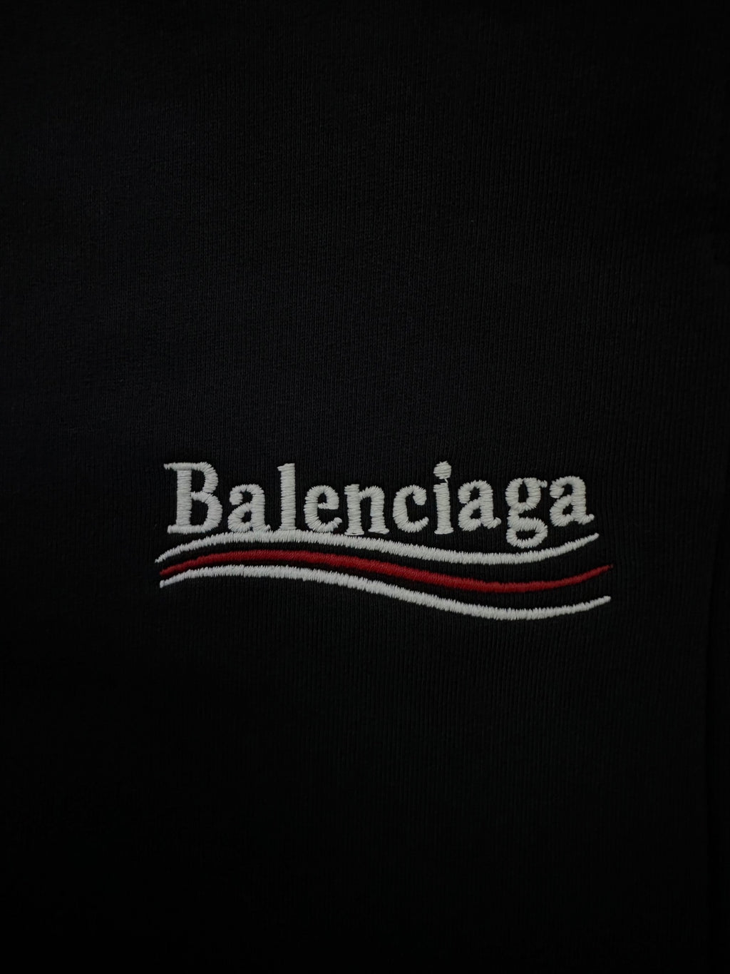 Black shorts with Balenciaga logo text