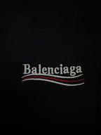 Black shorts with Balenciaga logo text