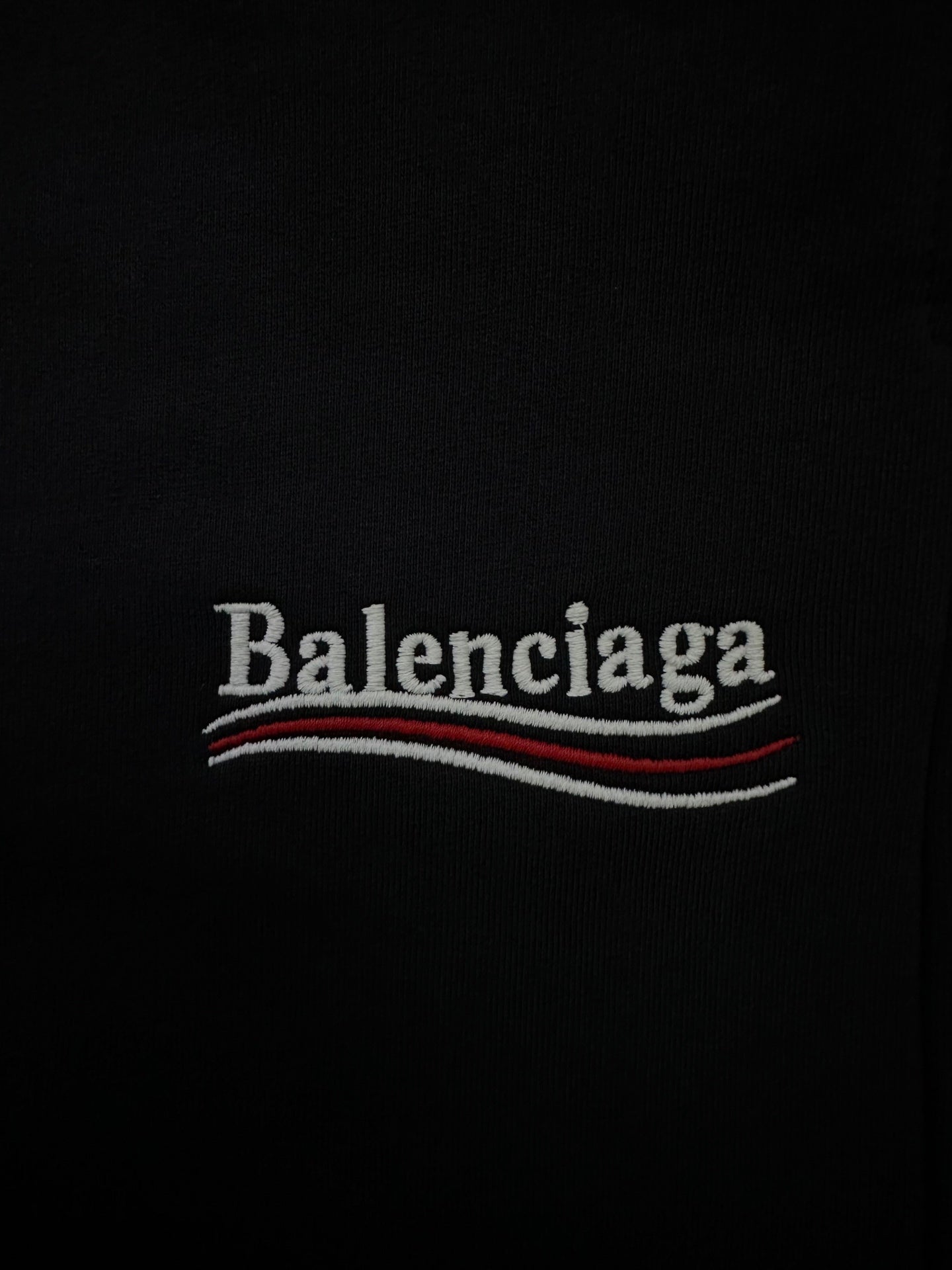 Black shorts with Balenciaga logo text