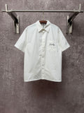 White short-sleeve button-up shirt with pointed collar and chest pocket, Diorbling script
