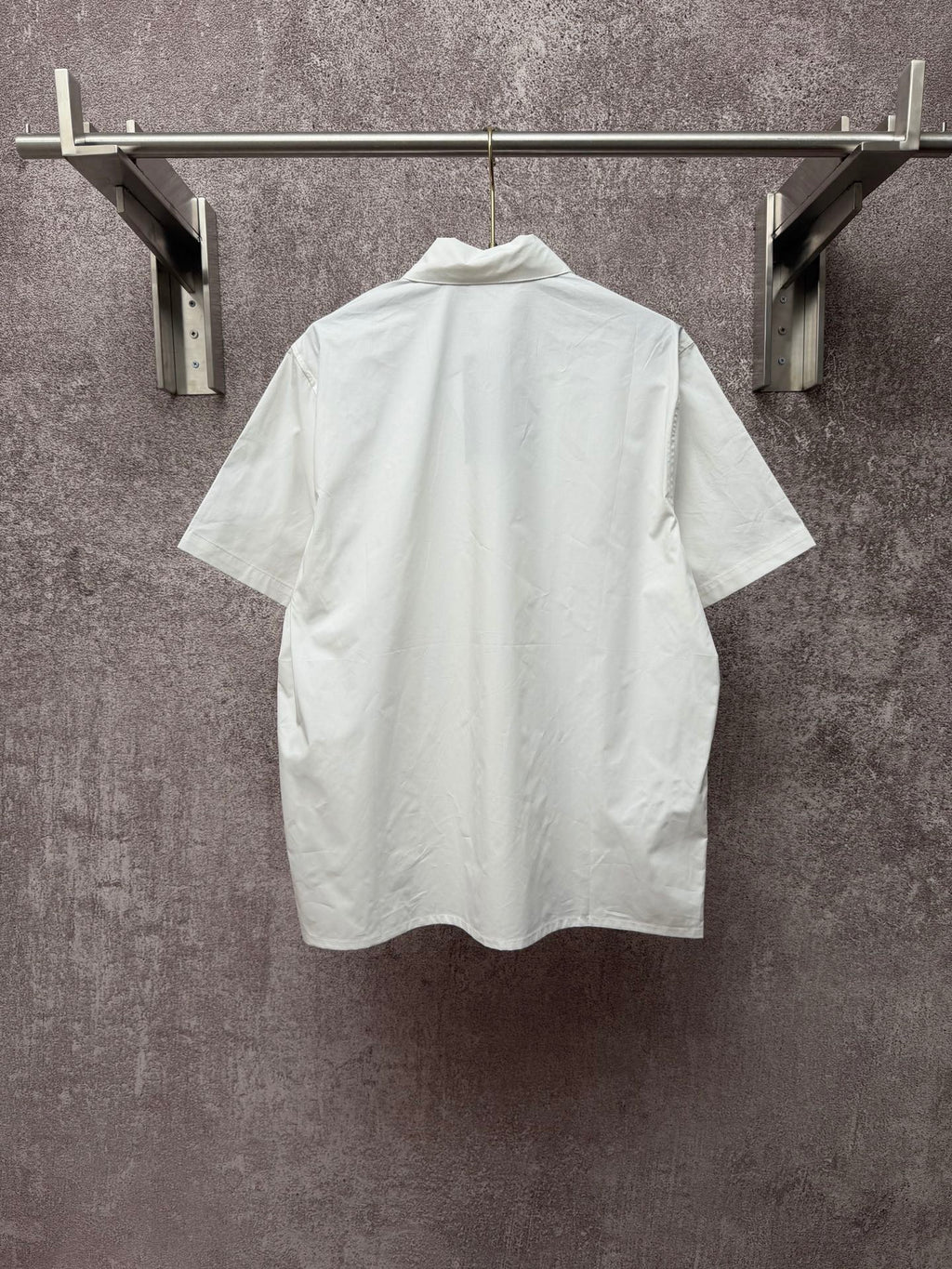 White short-sleeve button-up shirt with pointed collar, plain back