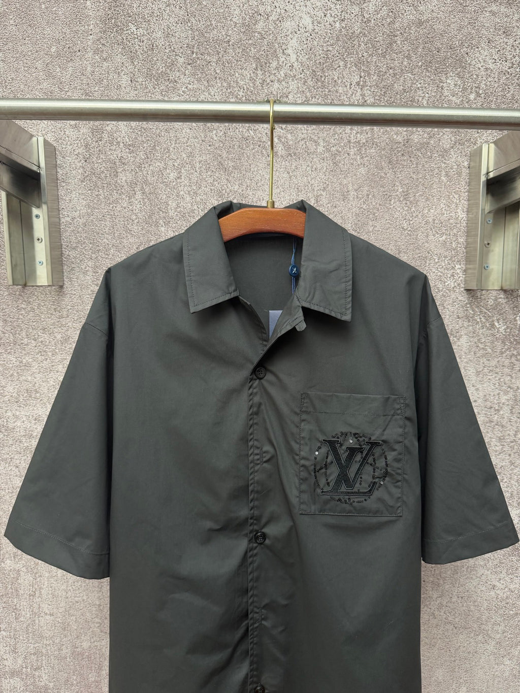 Short-sleeve button-up shirt with spread collar and LV logo patch on chest