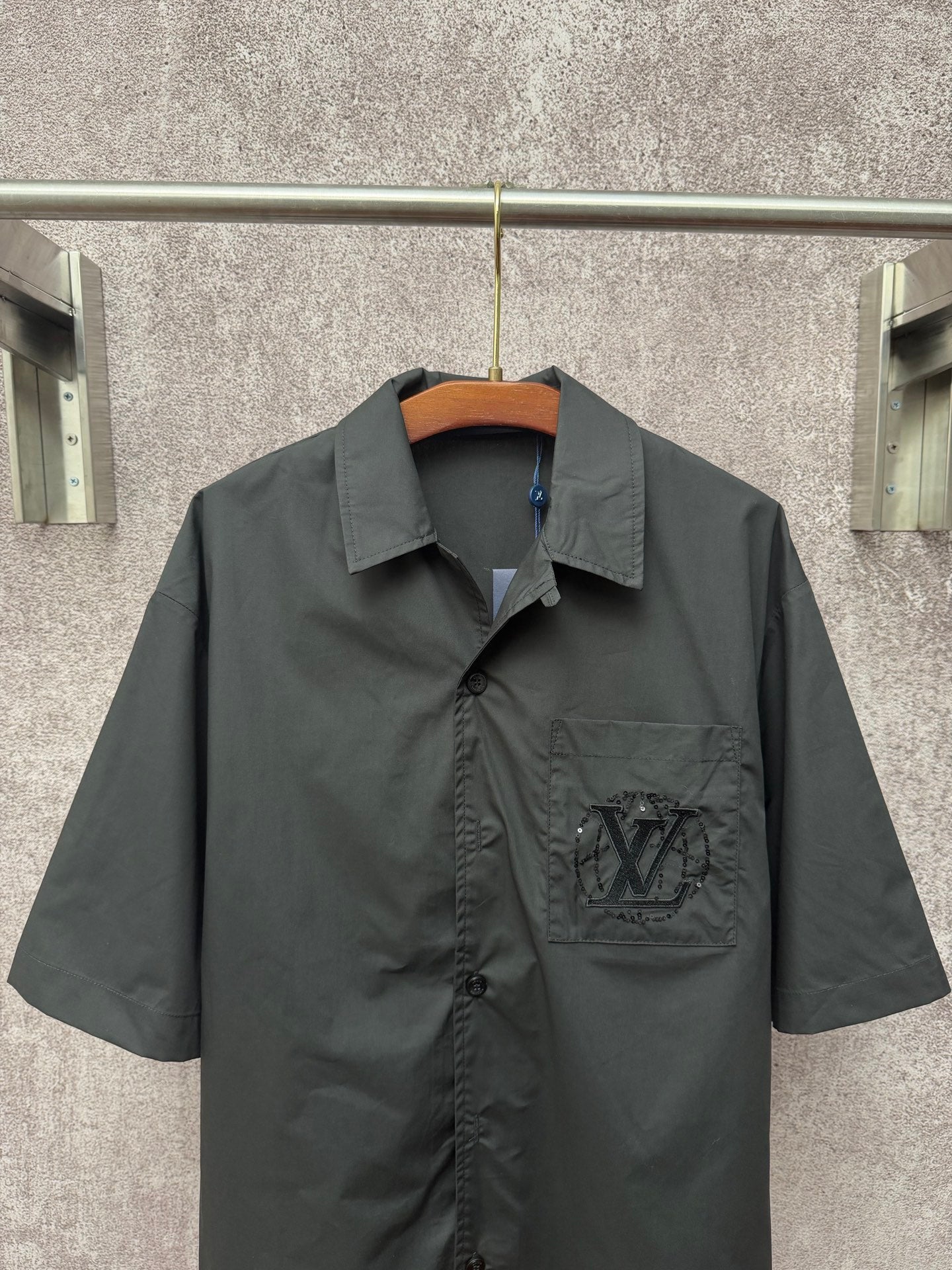 Short-sleeve button-up shirt with spread collar and LV logo patch on chest
