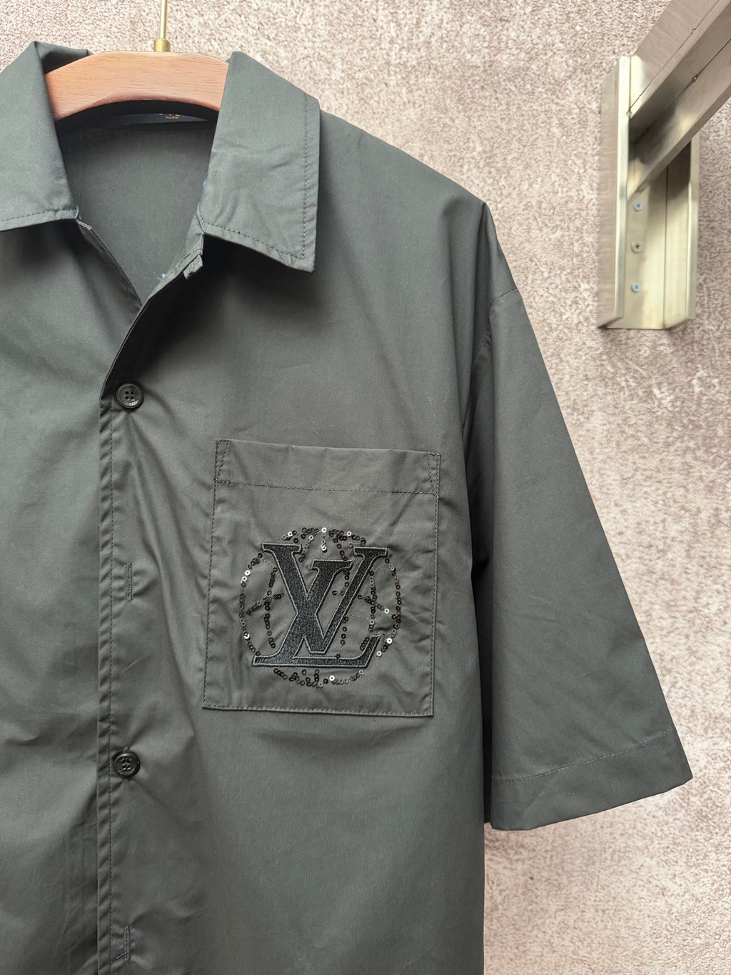 Short-sleeve shirt front panel with LV logo patch, chest pocket, and buttons