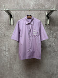 Men's short-sleeve button-up shirt in lavender with chest logo embroidery