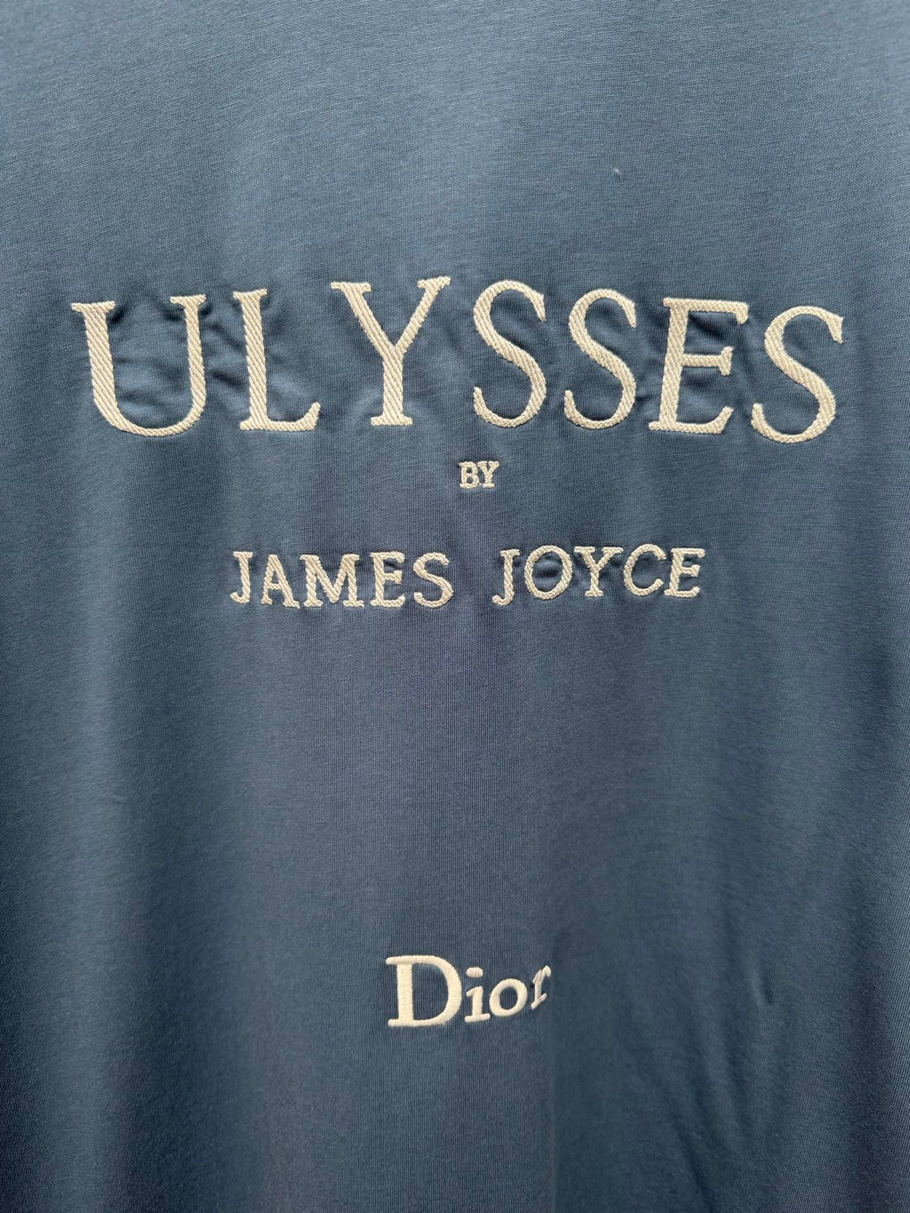 Blue T-shirt chest text: ULYSSES by James Joyce and Dior