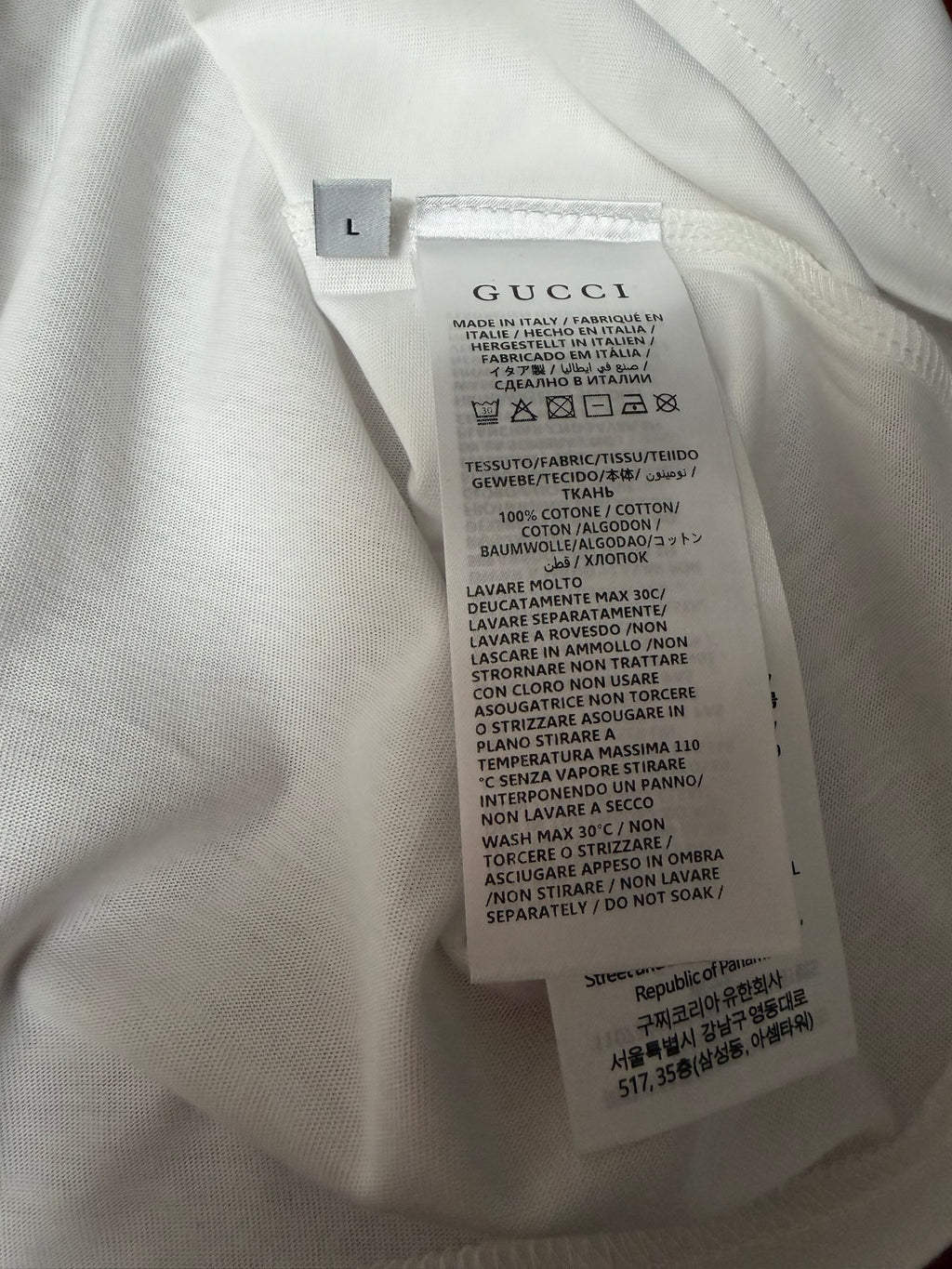 White Gucci T-shirt care label on inner collar