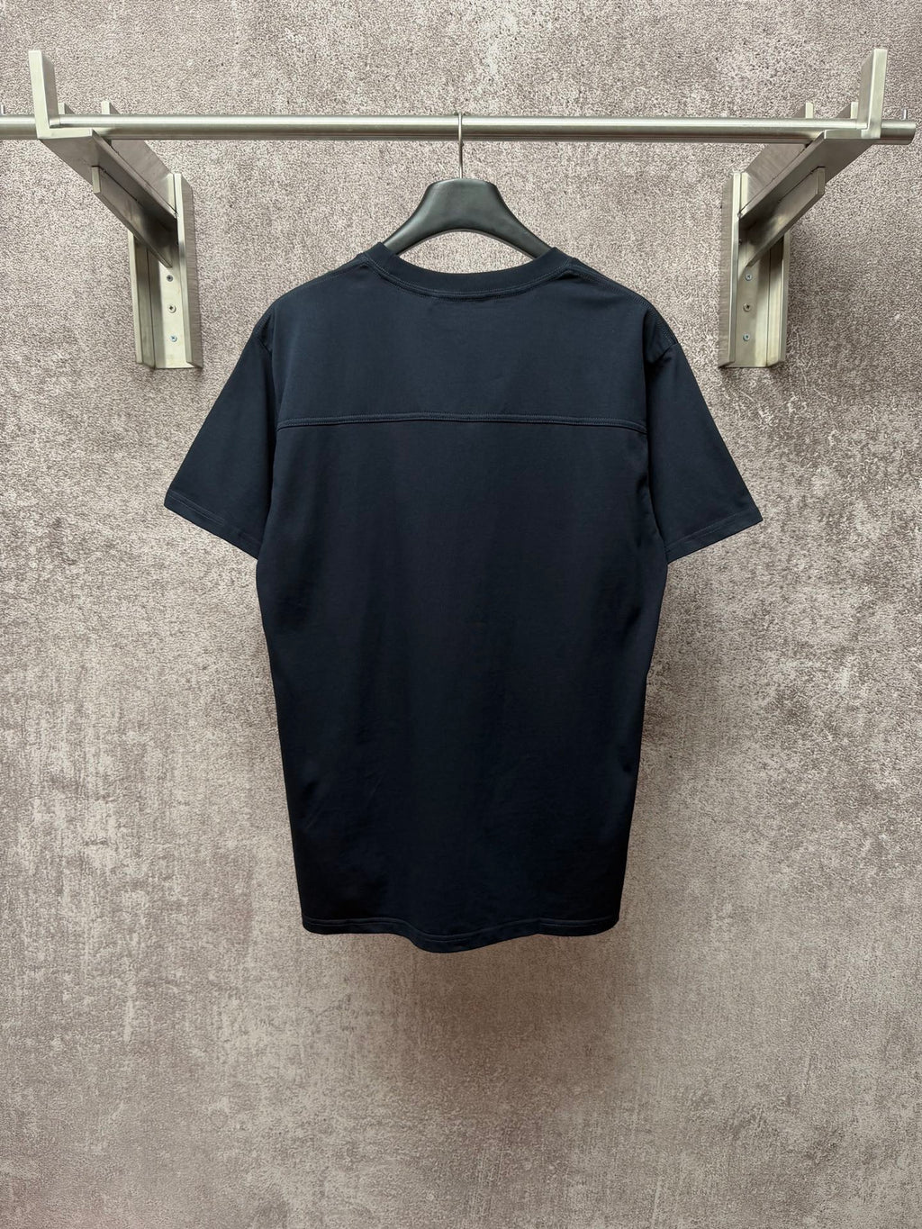Dark navy short-sleeve T-shirt, back view with stitched yoke seam