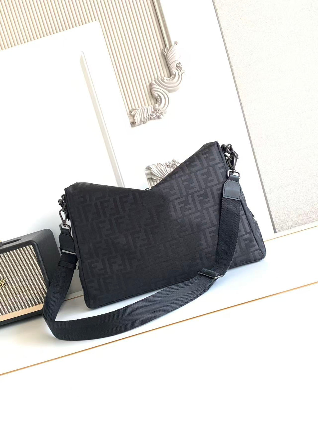 Fendi FF-pattern shoulder bag with top handle and crossbody strap