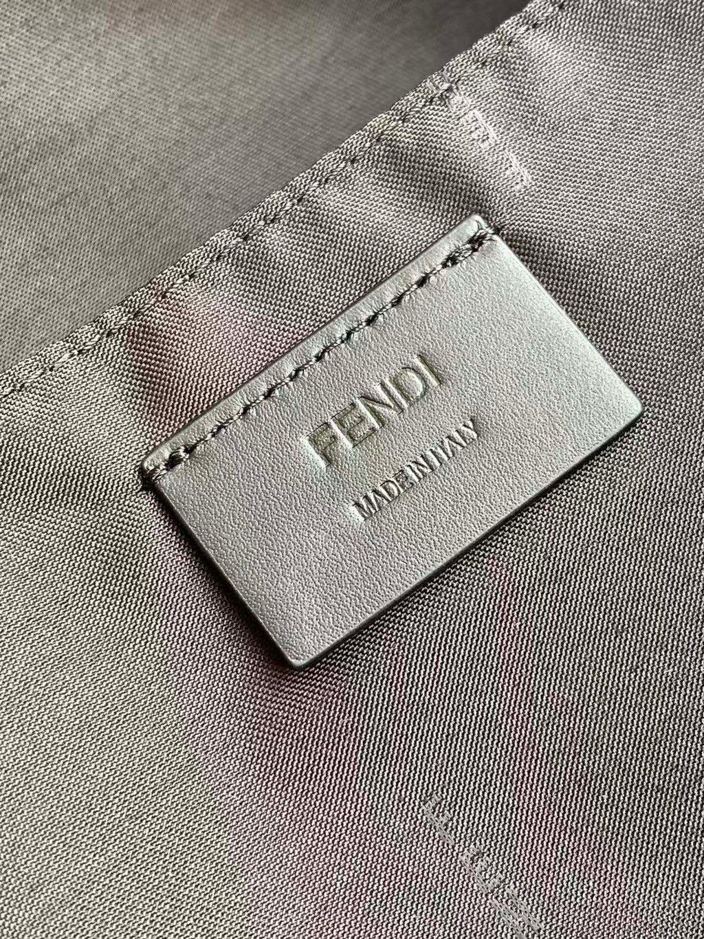 Fendi leather brand label reading “FENDI” and “MADE IN ITALY”