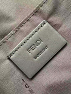 Fendi bag leather logo patch on gray fabric lining