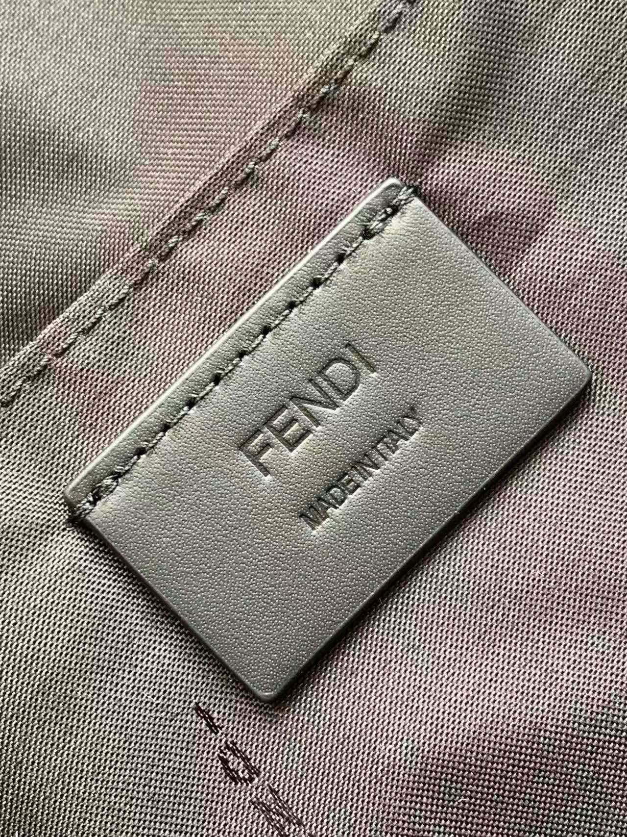 Fendi bag leather logo patch on gray fabric lining