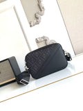 Fendi logo crossbody bag, dark navy with zip top and adjustable strap.