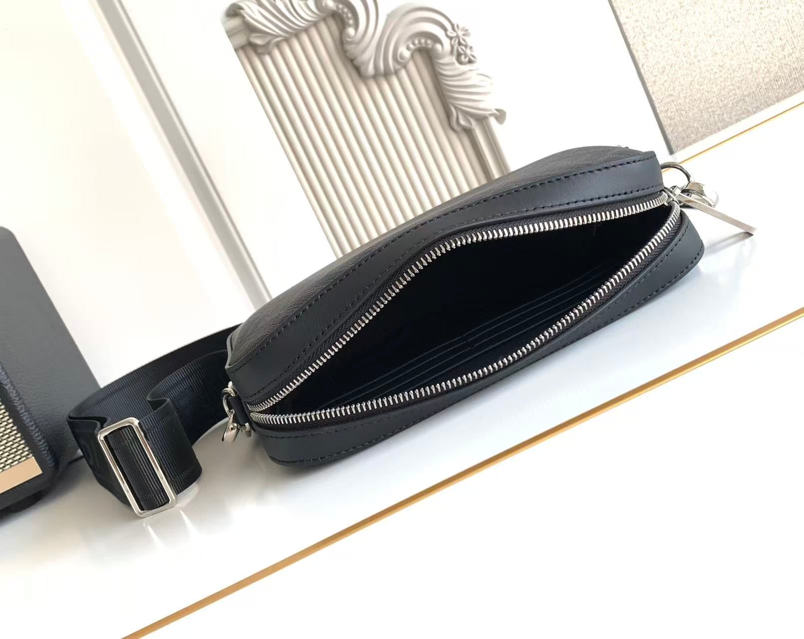 Fendi logo crossbody bag, top zip with double pull and adjustable strap.