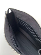 Fendi bag interior view with dark lining and multiple card-slot compartments.