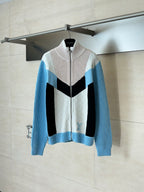 Louis Vuitton knit zip sweater with cream, black, and light blue color-block panels