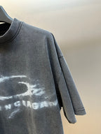 Balenciaga dark gray T-shirt with short sleeve and distressed chest graphic detail
