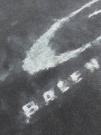 Balenciaga dark gray T-shirt with white distressed lettering graphic
